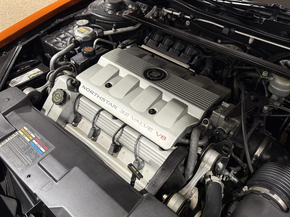 engine bay of a 1999 cadillac eldorado concept car, featuring a northstar 32 valve v8 engine with visible components and labeling.