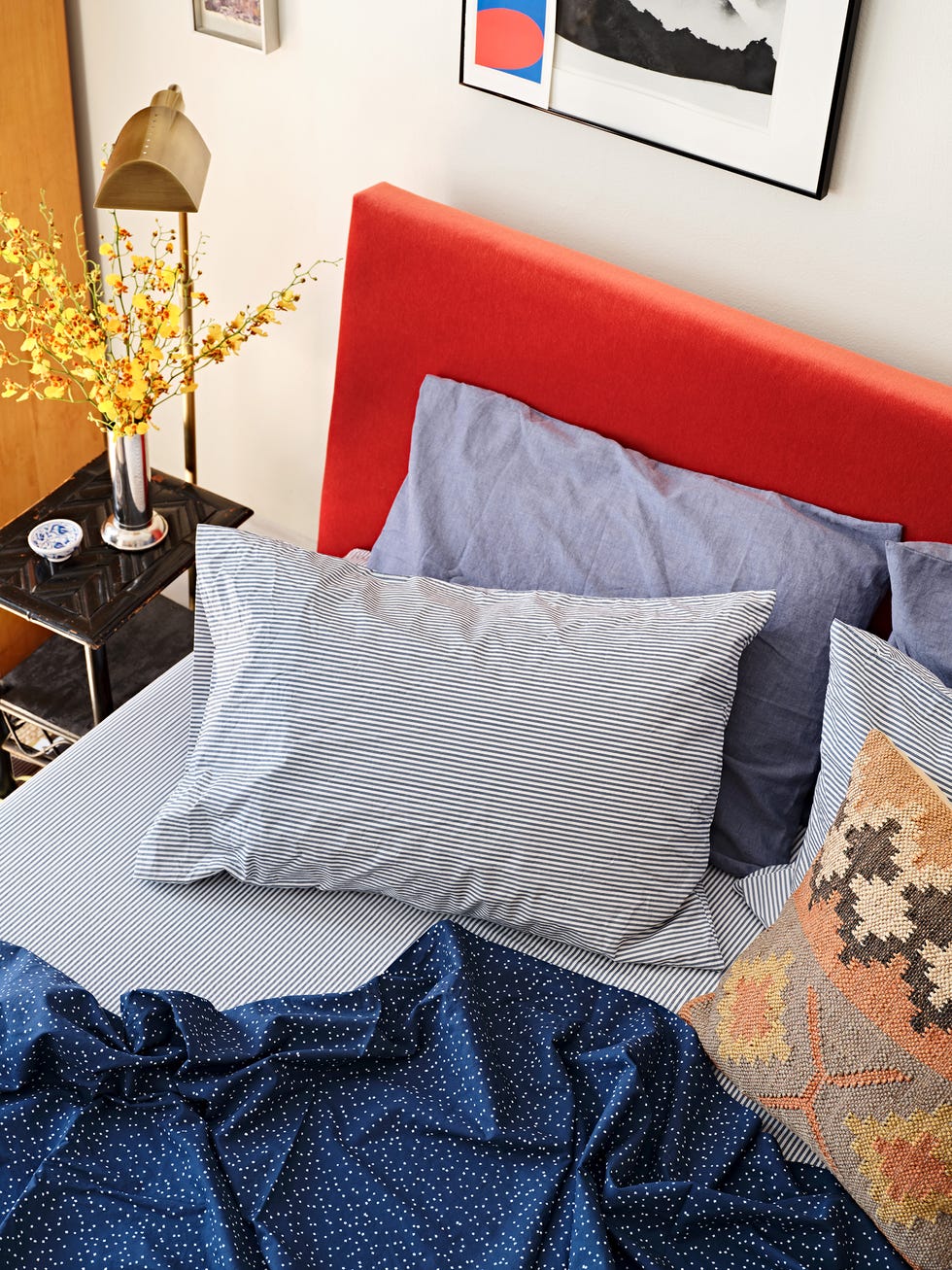 Bedding, pillows on bed with bedcover