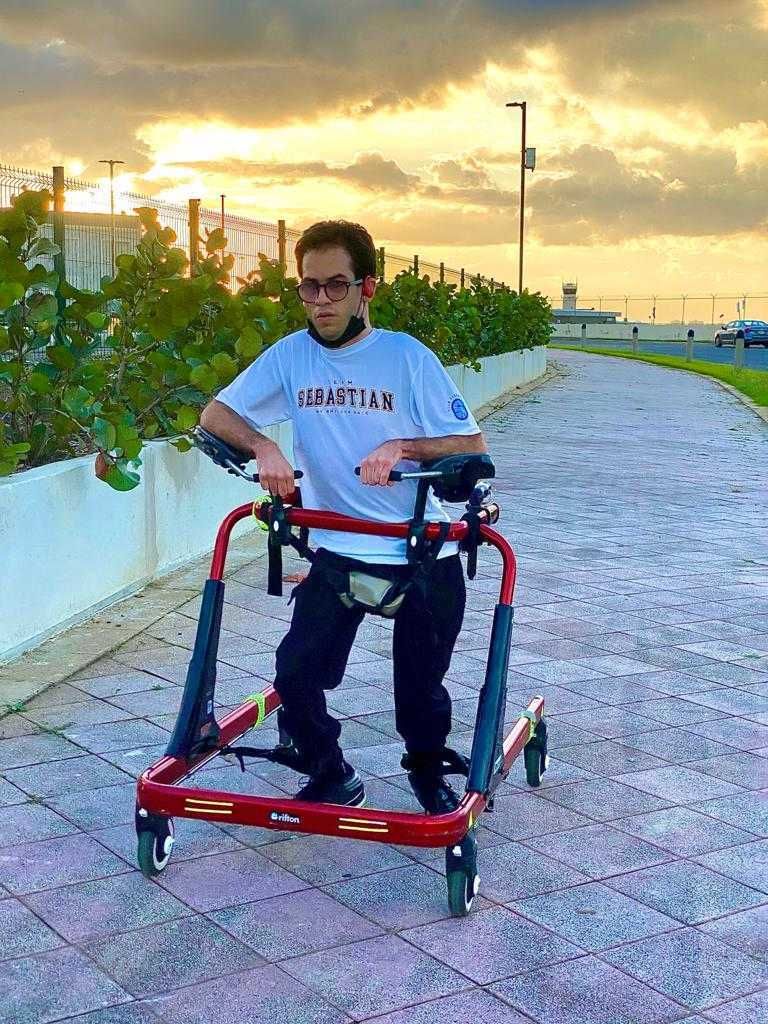 sebastian rosado running with his walker as part of his 21k in 30 days challenge