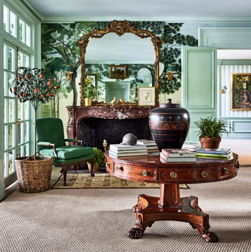 green living room with antiques