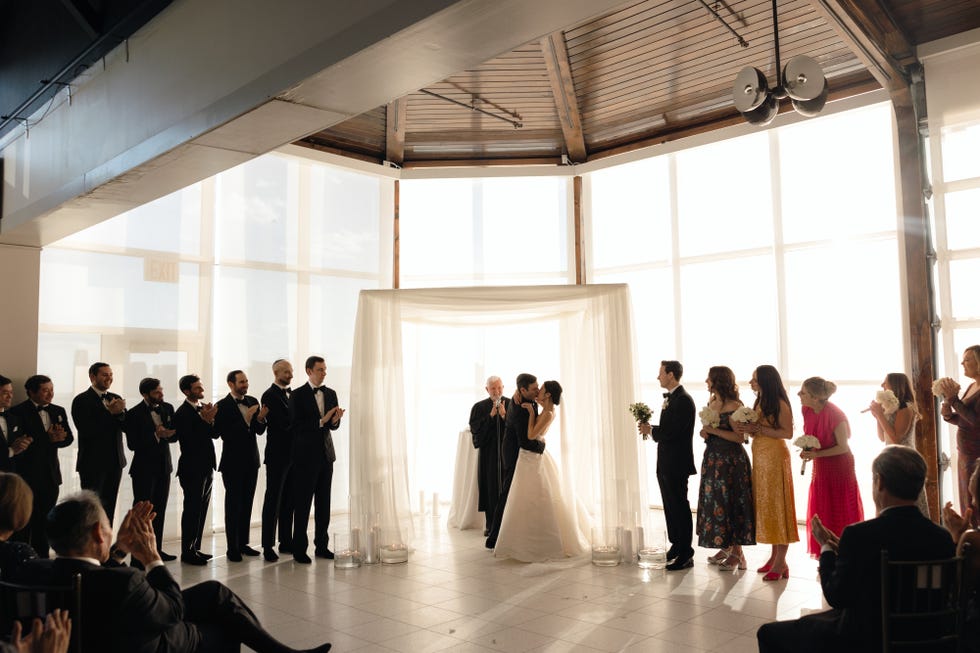 a wedding party in a room