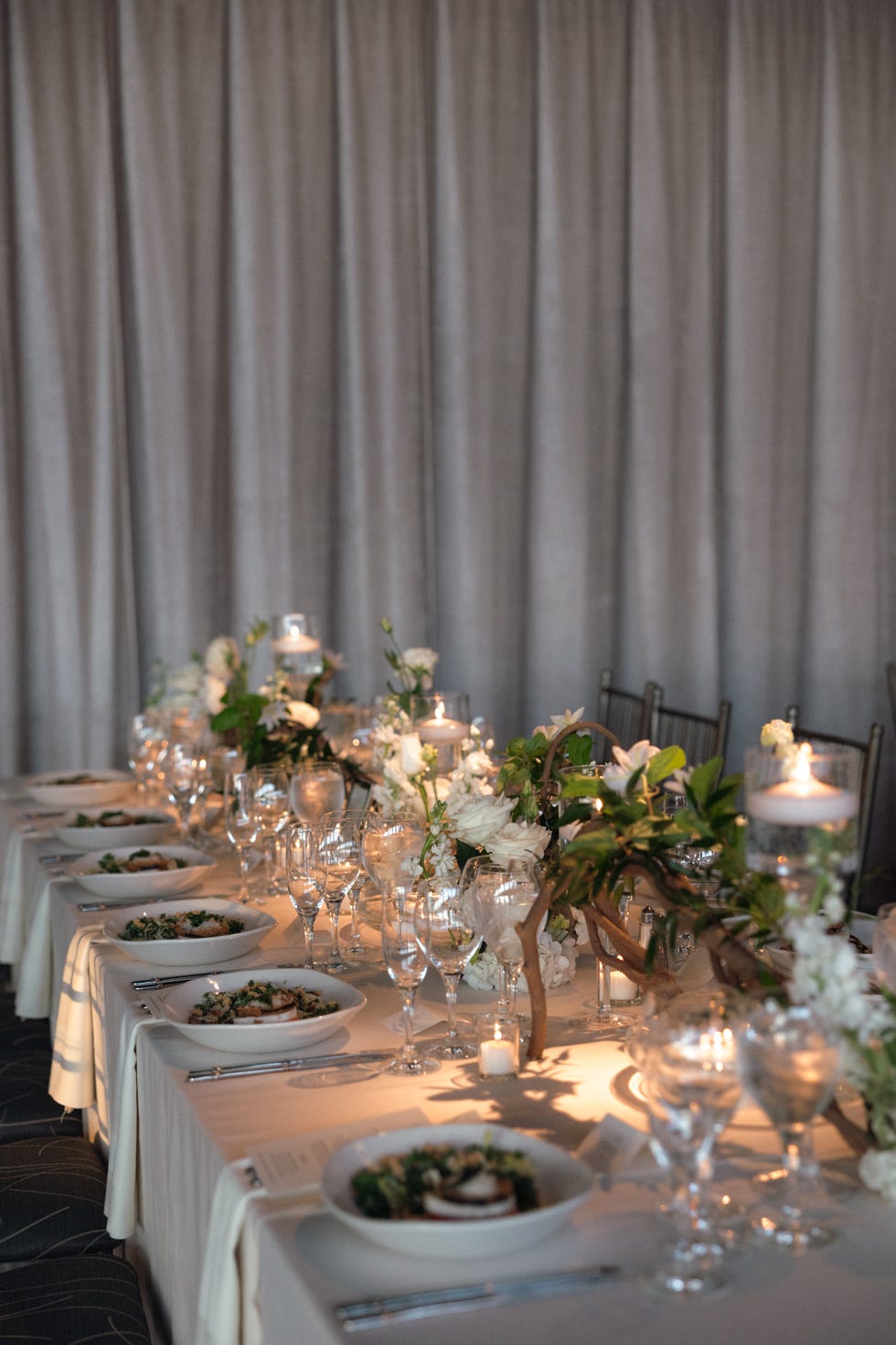 a table with plates and glasses