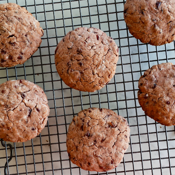 a group of cookies on a cooling rack