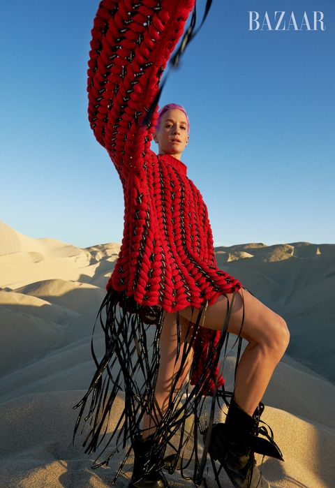 megan in red sweater on sand dunes