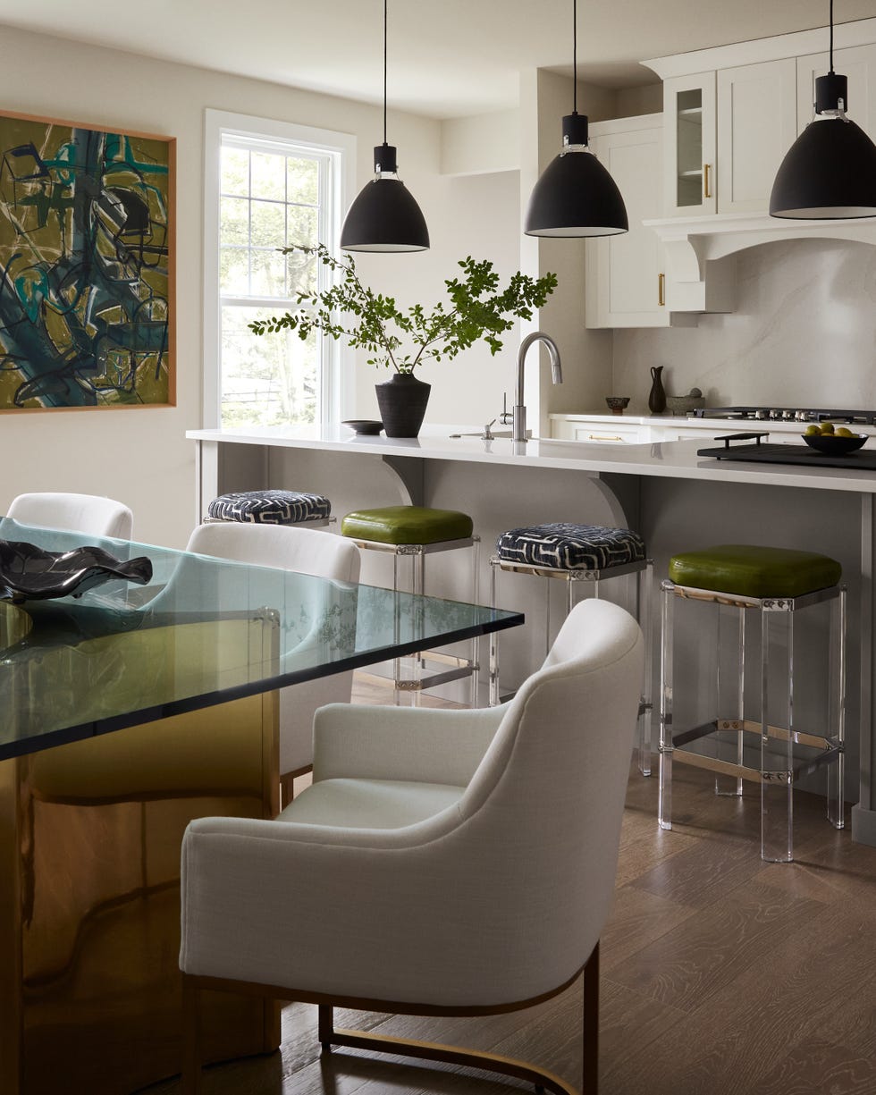 modern kitchen and dining area with elegant furnishings and decor