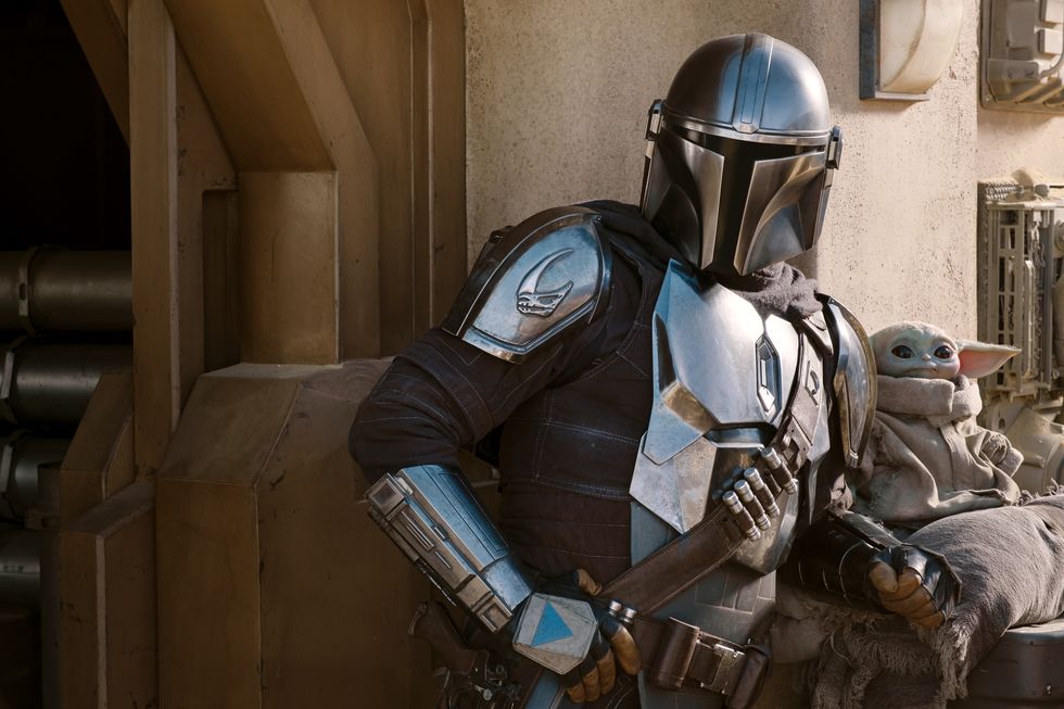 the mandalorian pedro pascal and the child in the mandalorian, season two, exclusively on disney