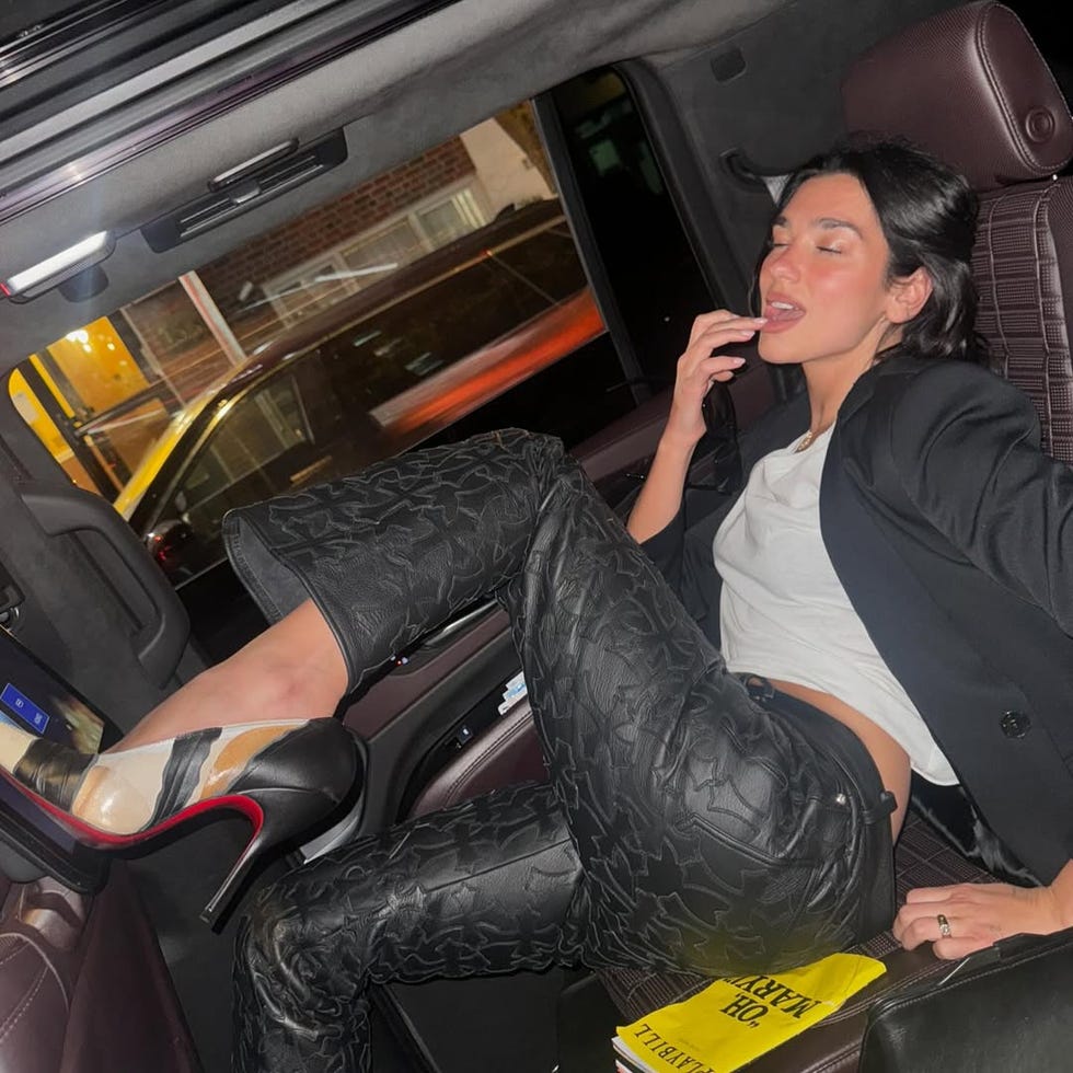 person relaxing in a luxury vehicle