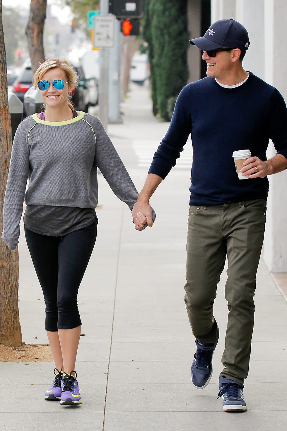People, Sportswear, Walking, Fashion, Street fashion, Standing, Footwear, Shoulder, Human, Interaction, 