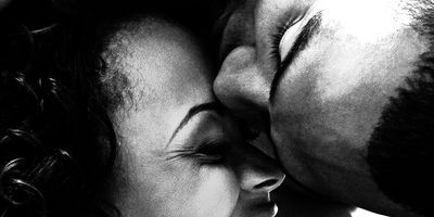 couple kissing loving black and white happy faces smile laugh