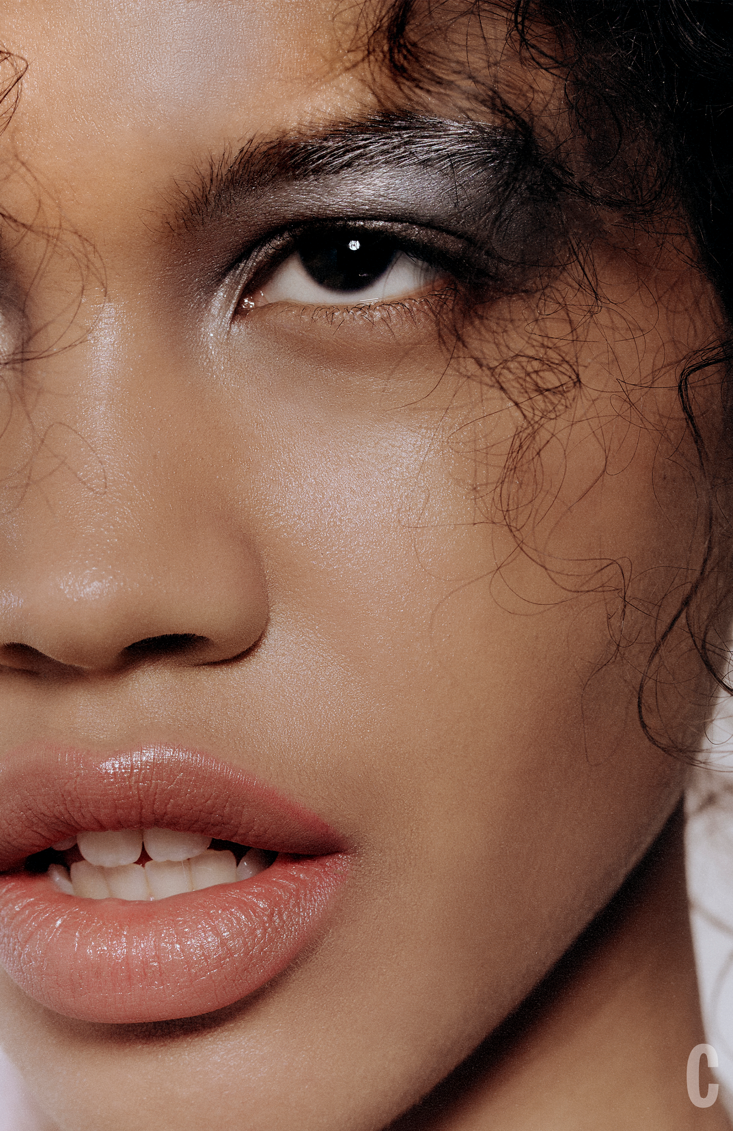 close up of woman with curls