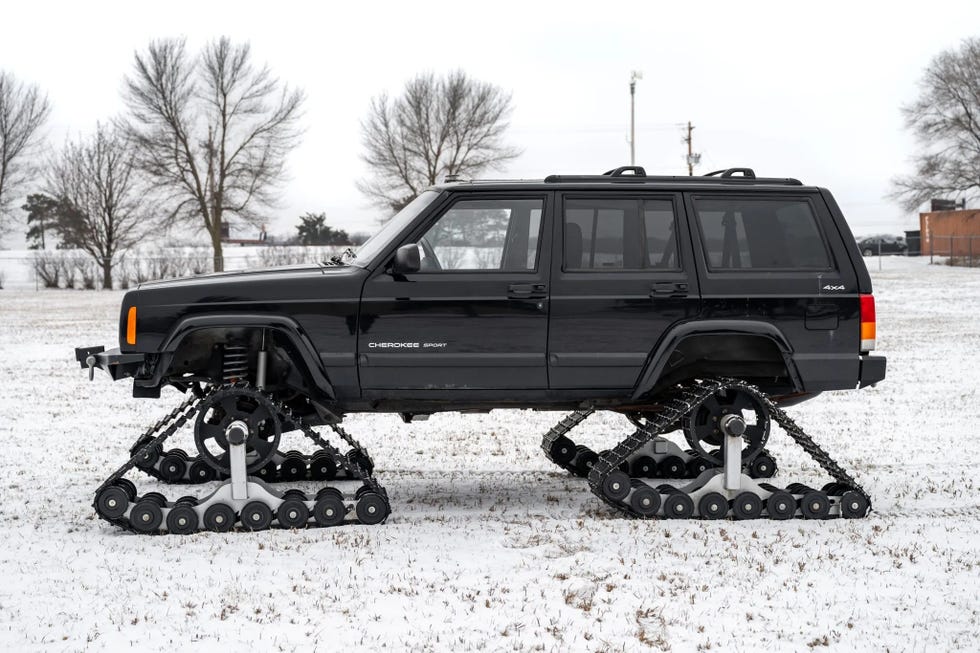 2001 jeep cherokee sport 4x4 with dominator track system side profile