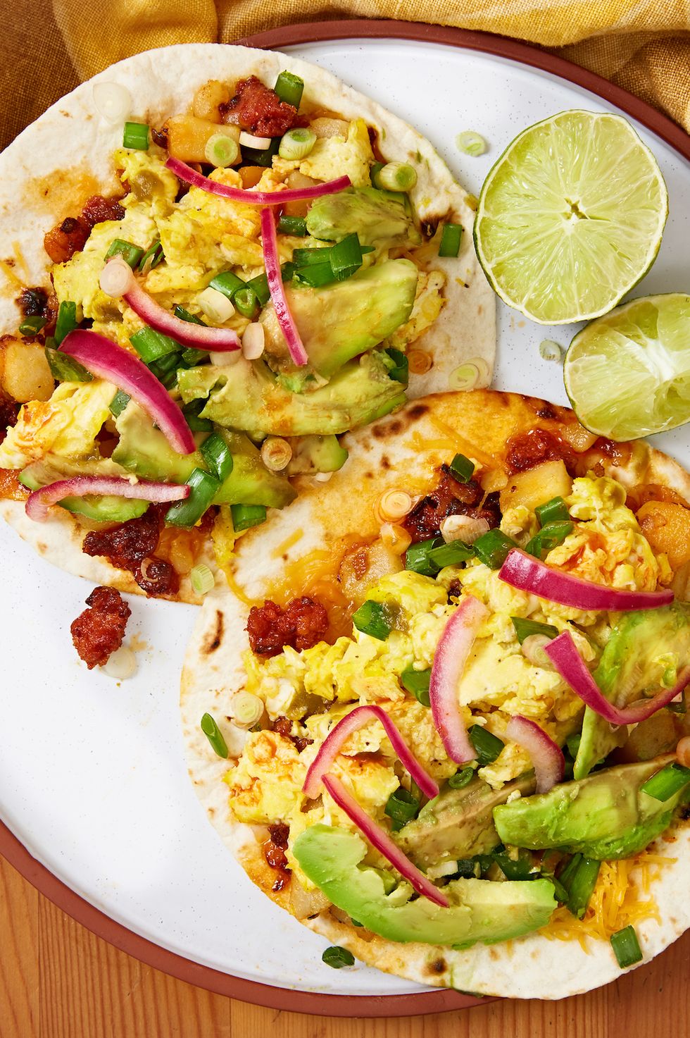 breakfast tacos with scrambled eggs on a flour tortilla