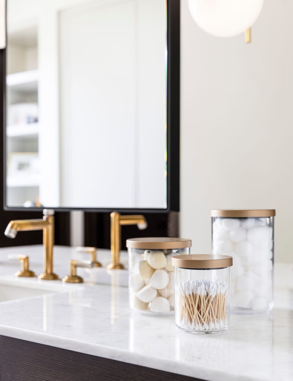 canisters in bathroom storage