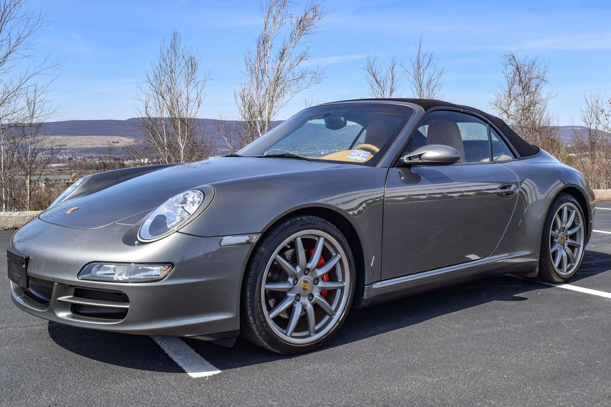 Miniature Porsche 911 Carrera 4S cabriolet gris arctique 2008