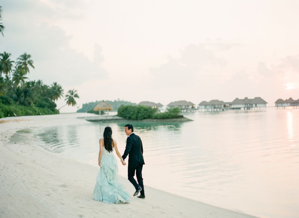 Body of water, Dress, Photograph, Coat, Bride, Suit, Wedding dress, Bank, People in nature, Interaction, 