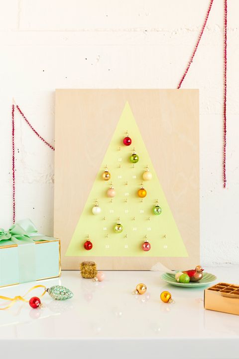 Christmas tree, Christmas decoration, Tree, Christmas ornament, Christmas, Triangle, Interior design, Fir, Cone, Table, 