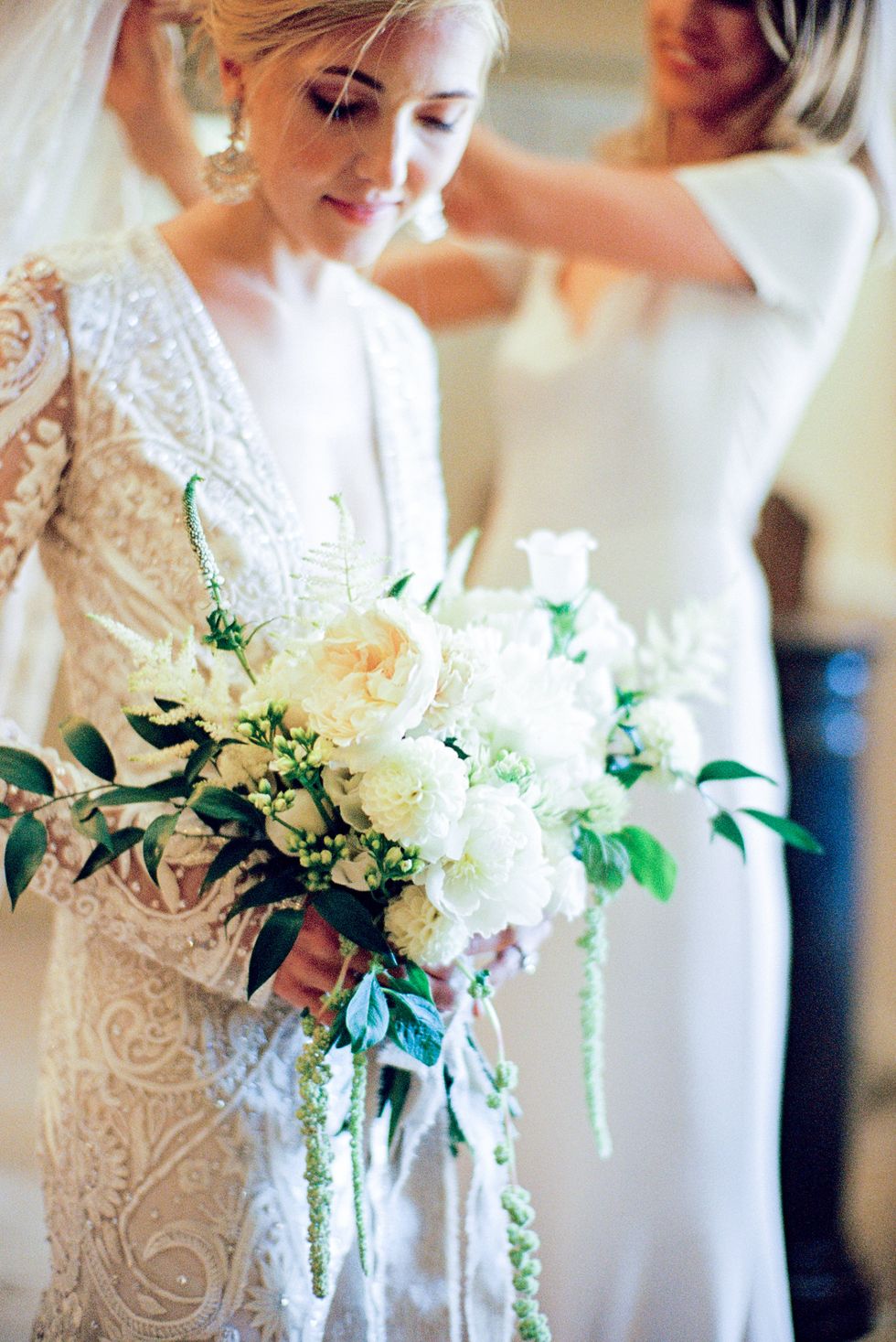 Bride, White, Wedding dress, Photograph, Bouquet, Flower Arranging, Bridal clothing, Gown, Dress, Floral design, 