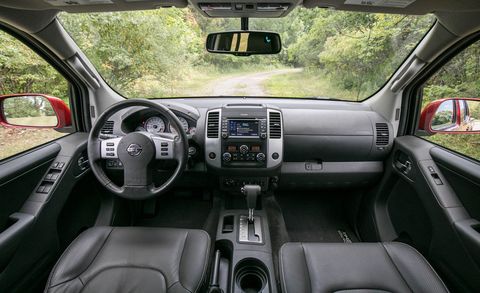 Land vehicle, Vehicle, Car, Center console, Steering wheel, Vehicle audio, Automotive tire, Nissan, Nissan navara, Rim, 