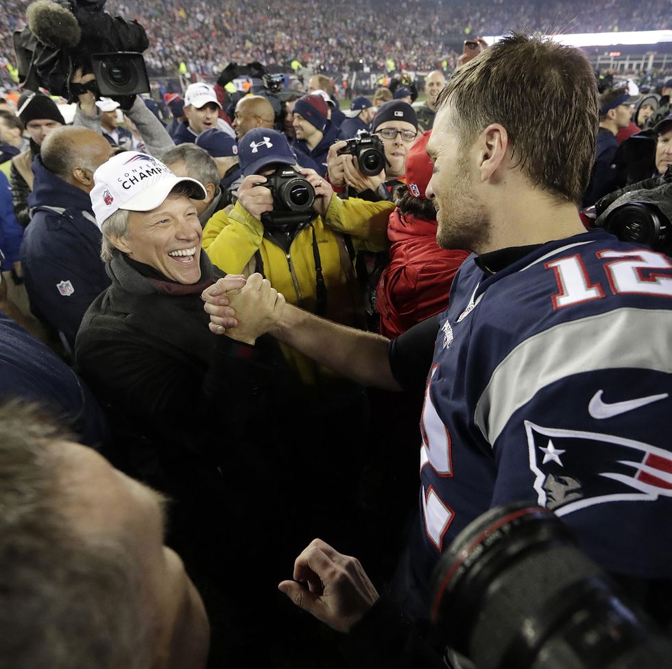txgdgb jon bon jovi congratulates with new england patriots tom brady on the field after the game against the pittsburgh steelers in the afc championship game at gillette stadium in foxborough, massachusetts on january 22, 2017 the patriots defeated the steelers 36 17 and advance to play the nfc champion atlanta falcons in super bowl li in houston texas photo by john angelillo upi