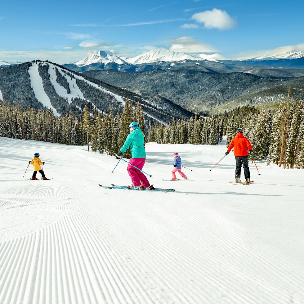 family skiing at keystone