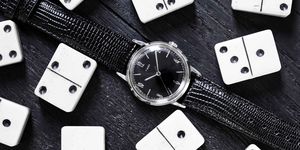 Black, Games, Fashion accessory, Font, Material property, Strap, Watch, Watch accessory, Black-and-white, Rectangle, 