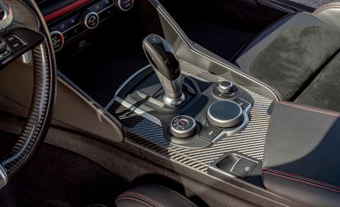 Vehicle, Center console, Car, Gear shift, Auto part, Steering wheel, 