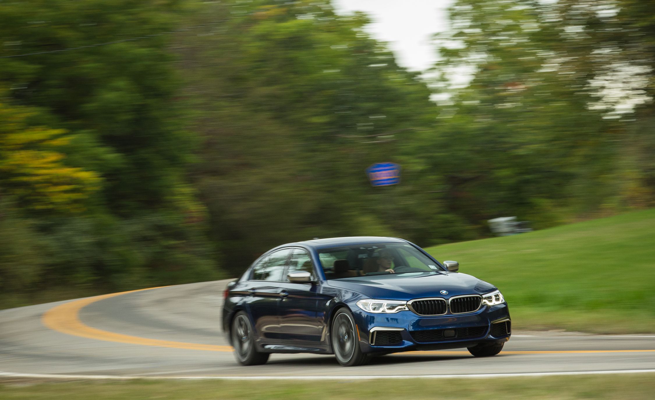 BMW 5 Series: Storage compartments in the cargo area BMW 5 Series: Storage compartments in the cargo area