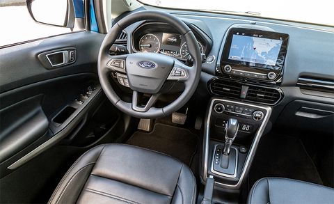 Land vehicle, Vehicle, Car, Motor vehicle, Center console, Mid-size car, Ford motor company, Steering wheel, Ford, Sport utility vehicle, 