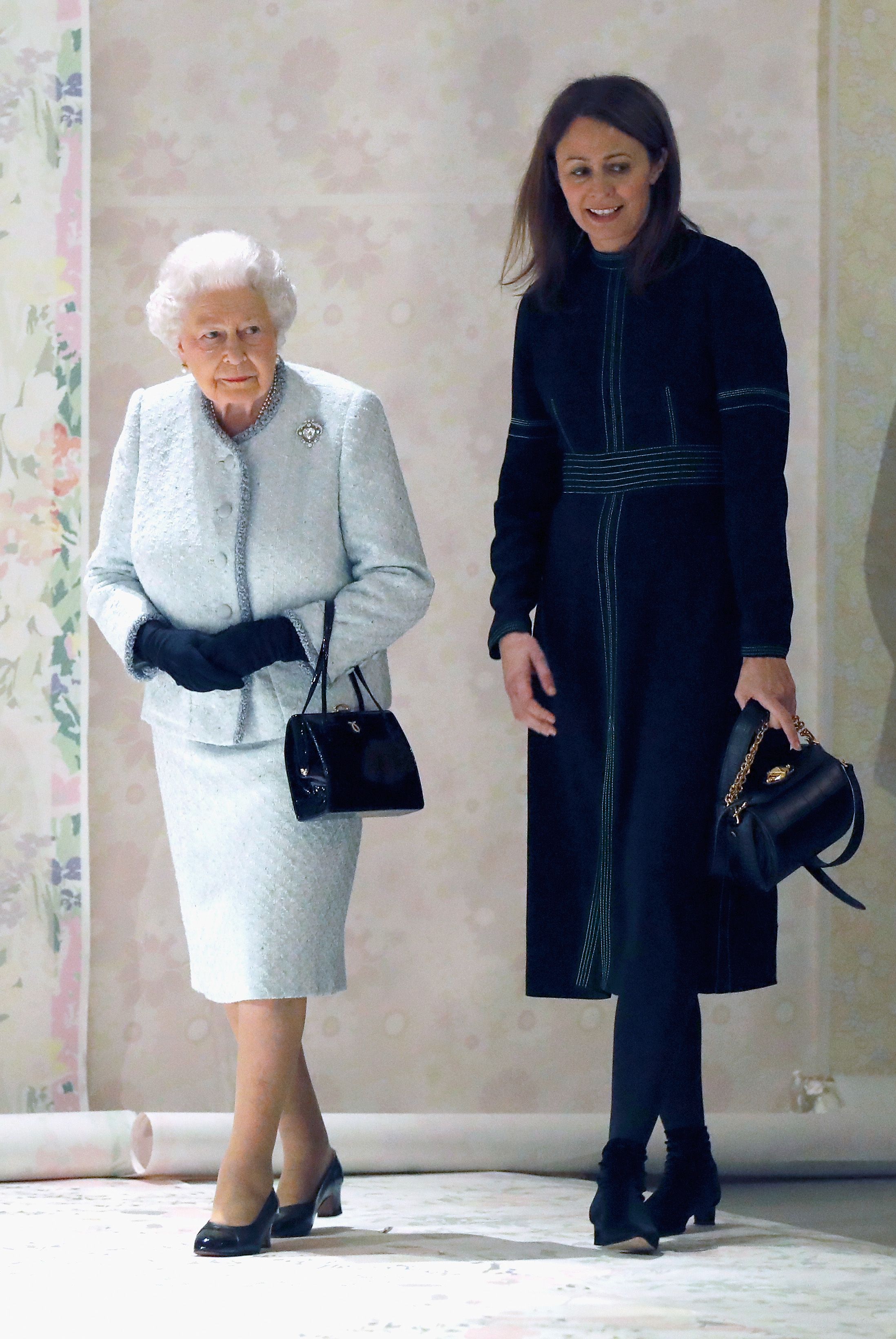 Know why Queen Elizabeth II always carried her black handbag along? It  wasn't just a fashion statement