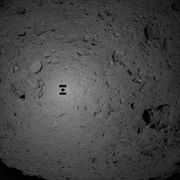 jaxa's hayabusa 2 spacecraft descends upon the asteroid ryugu