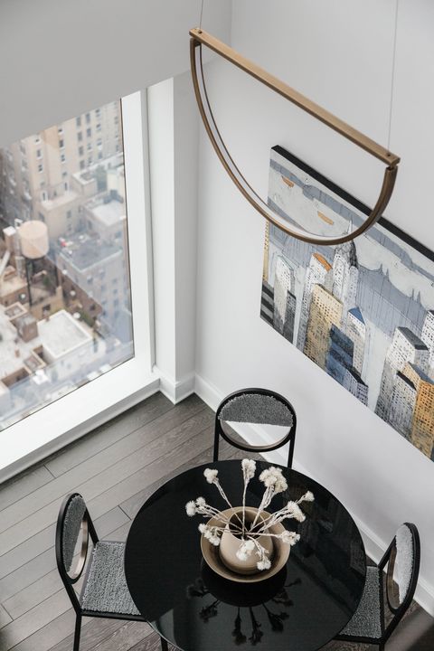 black dining table, new york city, artwork