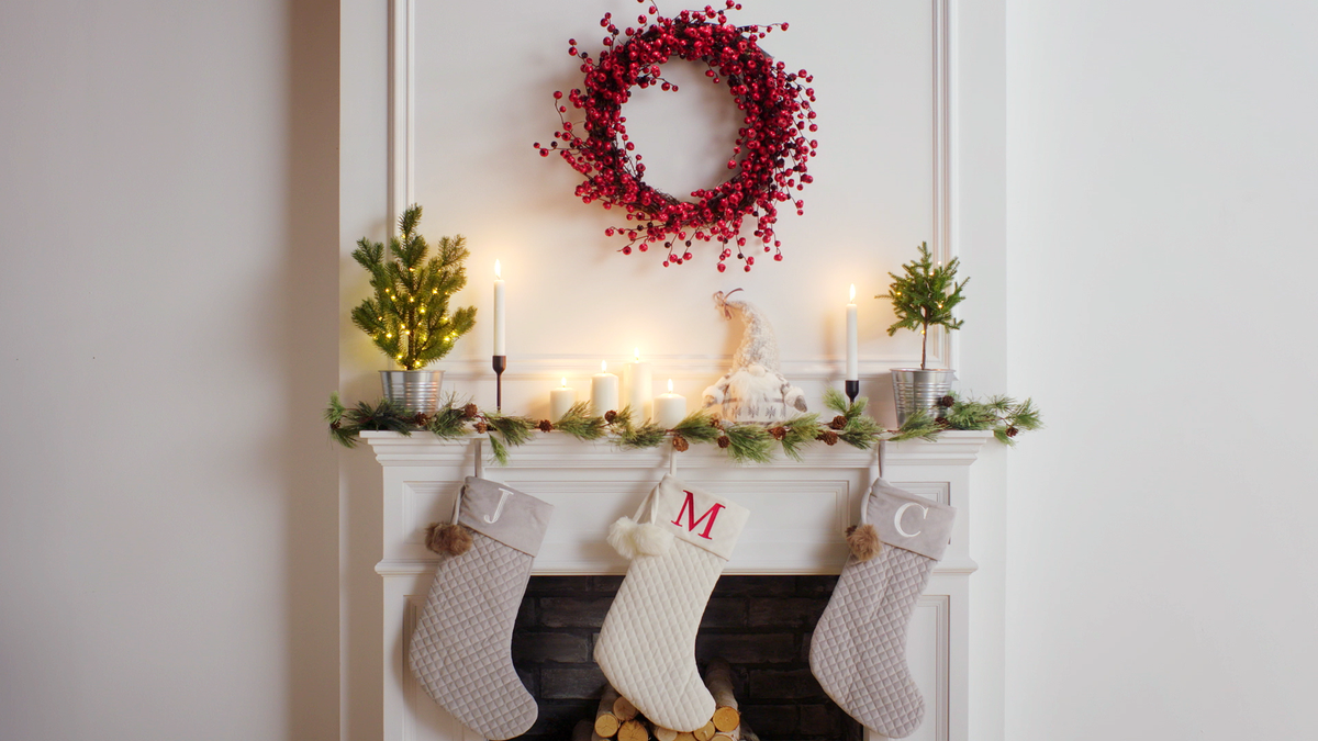Christmas decoration, Christmas stocking, Room, Christmas, Interior design, Wreath, Furniture, Interior design, Twig, Table, 
