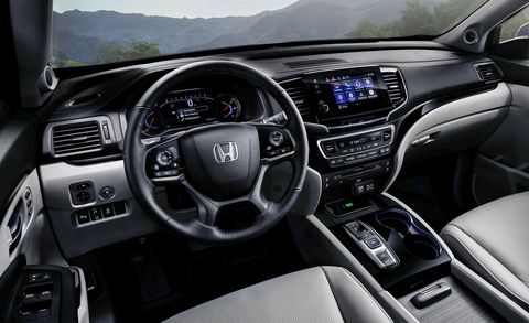 Land vehicle, Vehicle, Car, Center console, Honda, Motor vehicle, Steering wheel, Electronics, Automotive design, Honda ridgeline, 