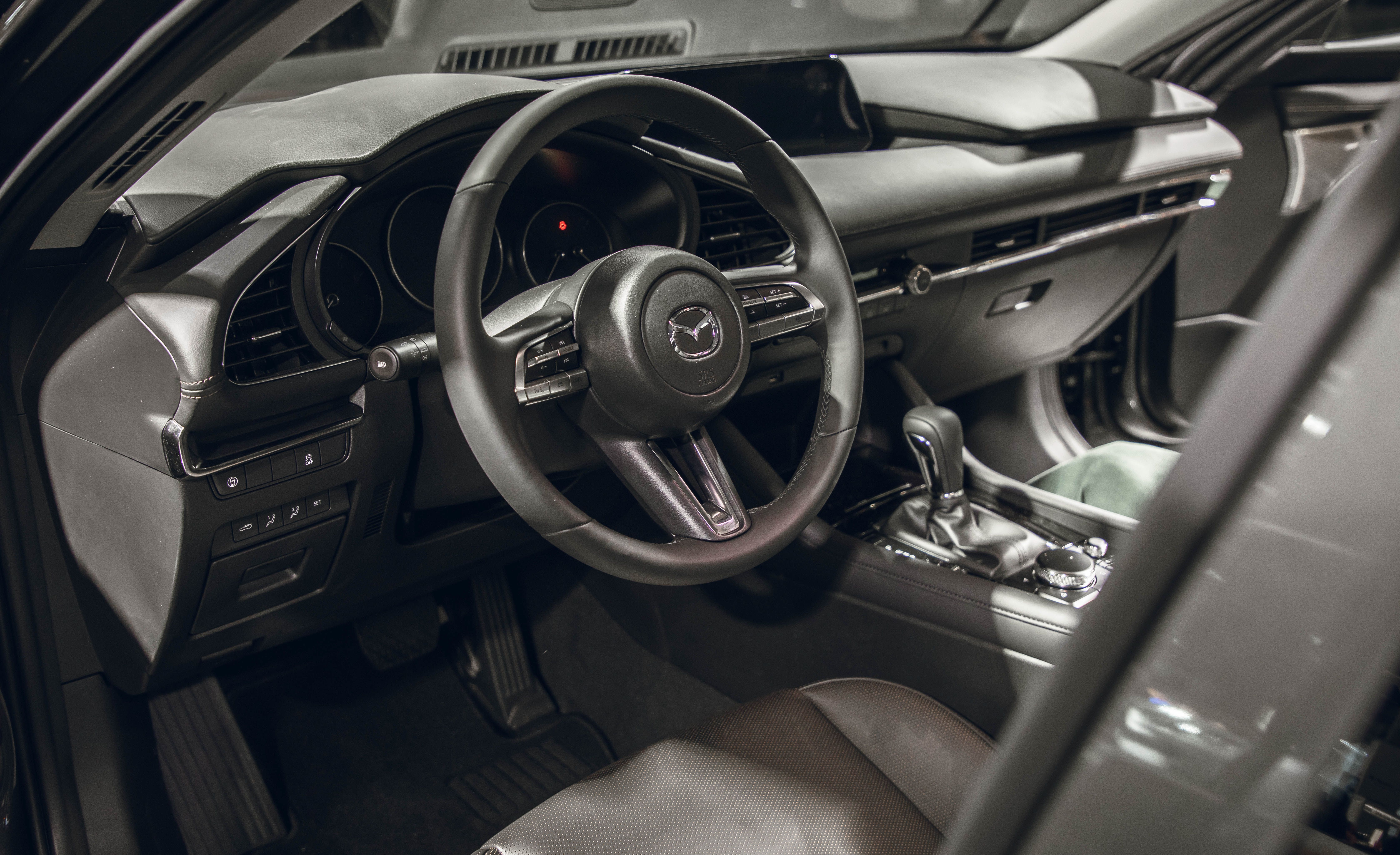 Mazda Mazda 3 Reviews | Mazda Mazda 3 Price, Photos, and Specs | Car and Driver
