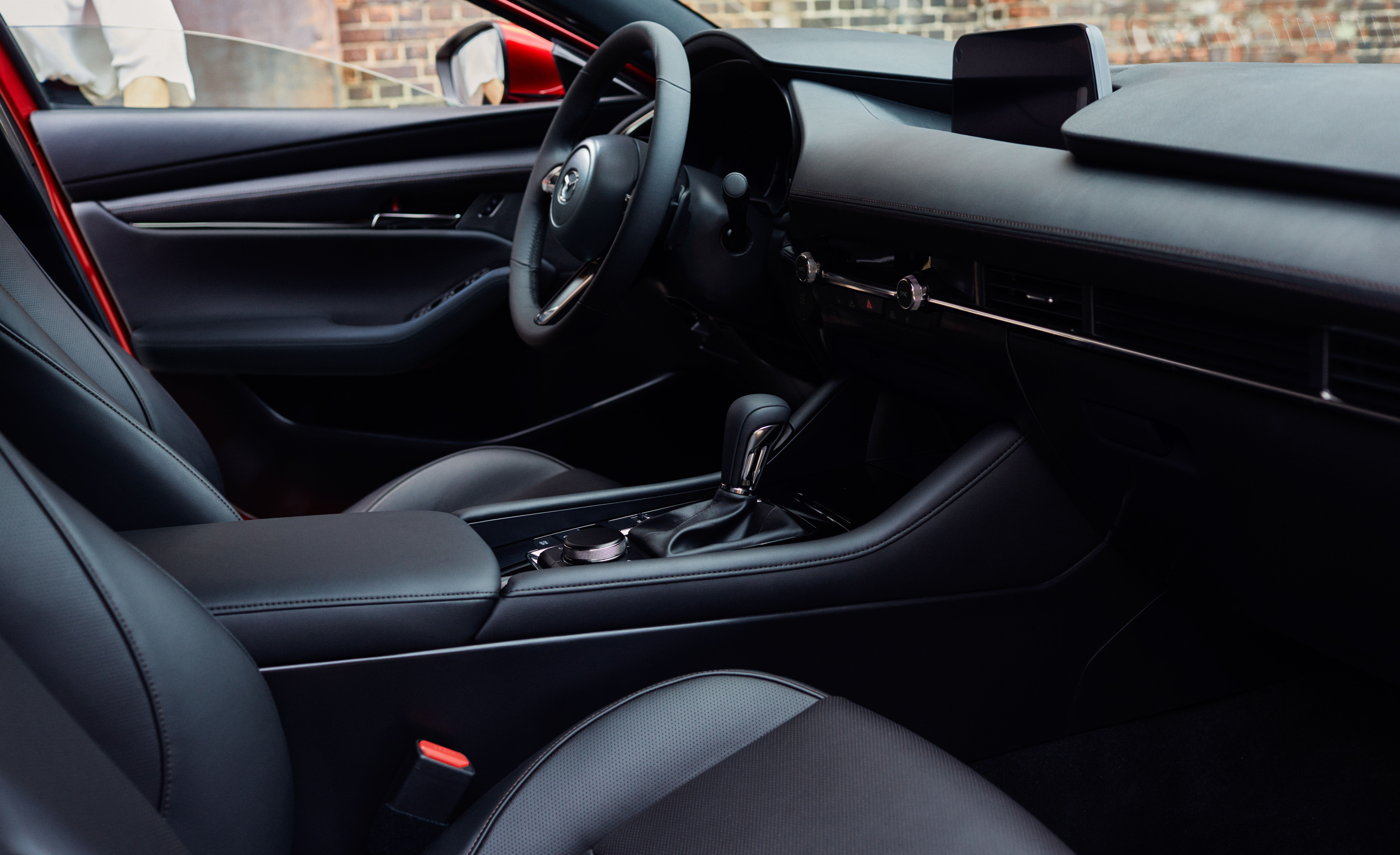 Mazda Mazda 3 Reviews | Mazda Mazda 3 Price, Photos, and Specs | Car and Driver