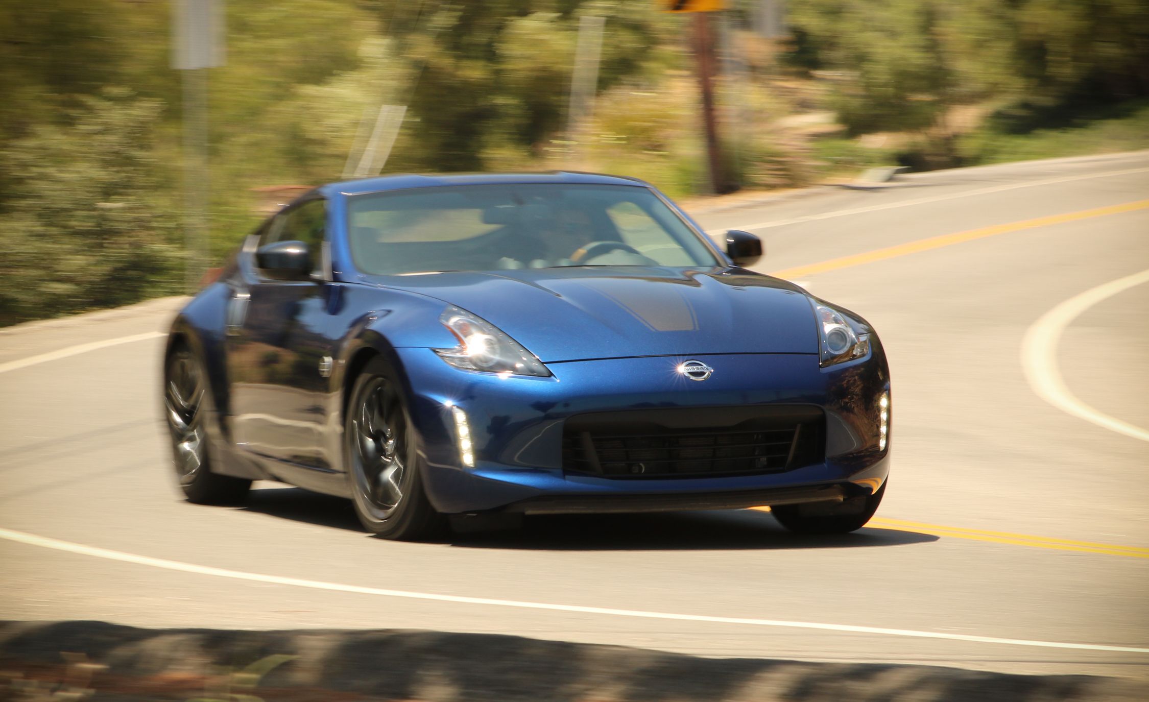 Nissan Z Reviews Nissan Z Price Photos And Specs Car And Driver