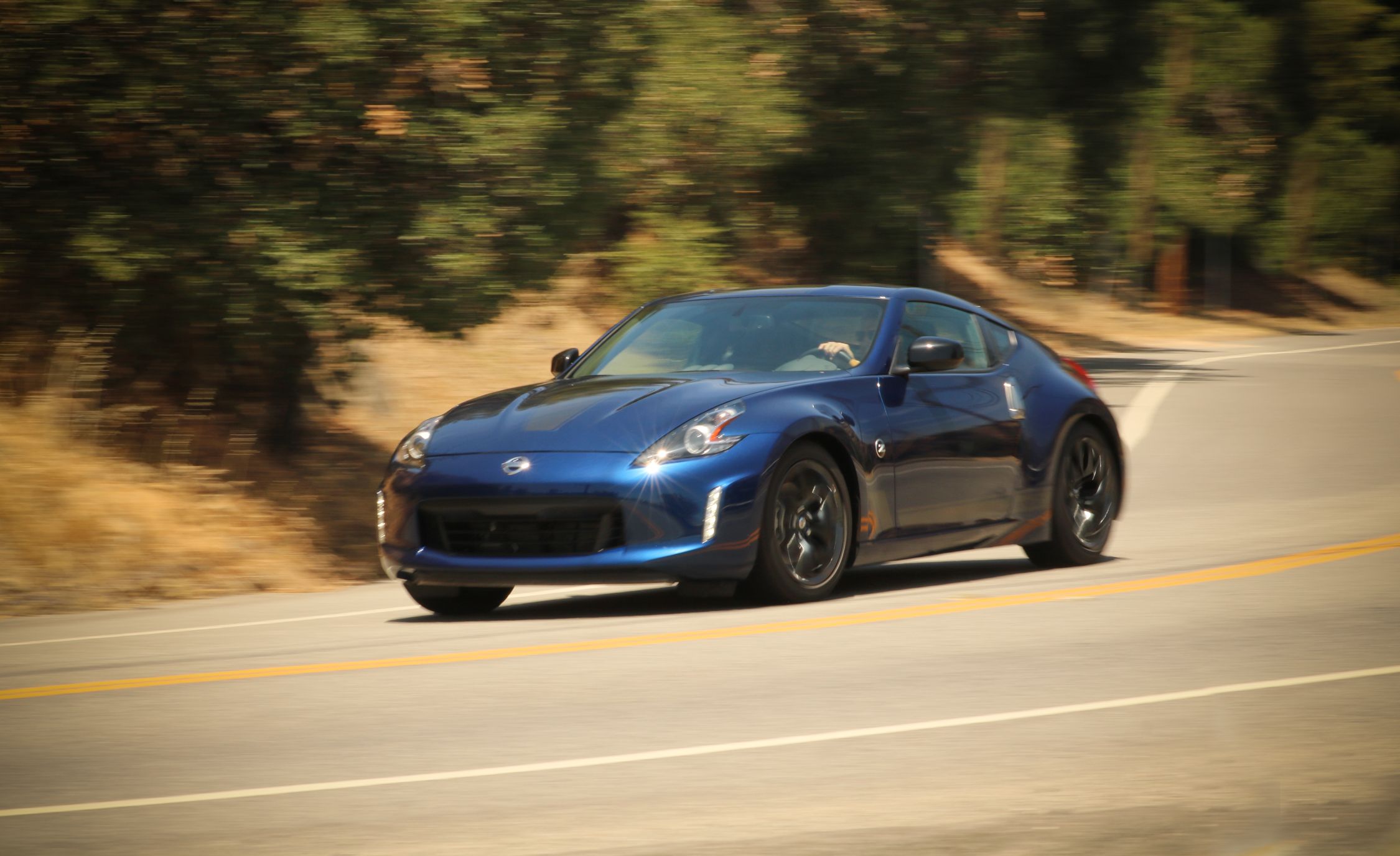 Nissan Z Reviews Nissan Z Price Photos And Specs Car And Driver