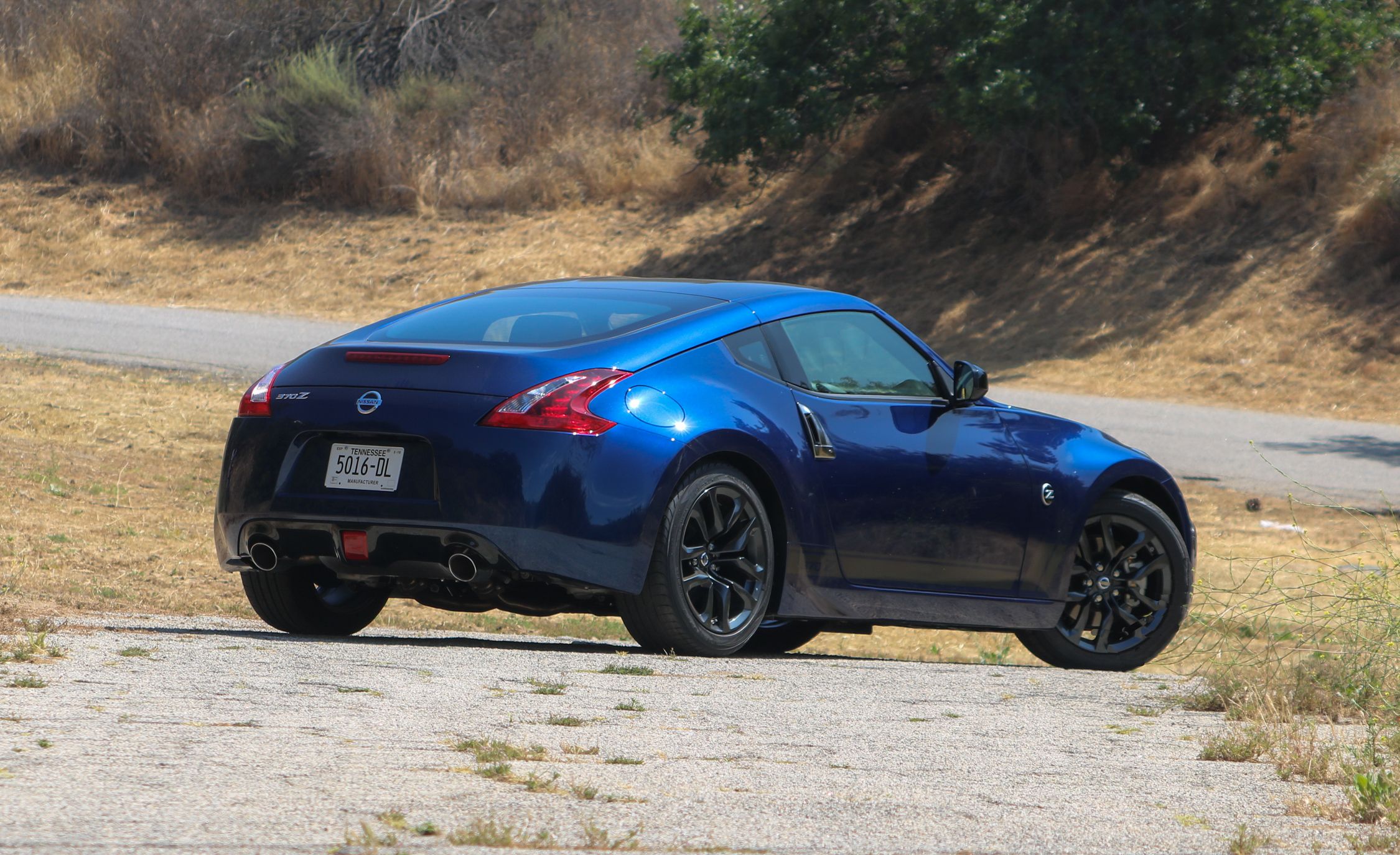 Nissan Z Reviews Price Photos And Specs Car Driver