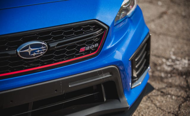 land vehicle, vehicle, car, automotive design, subaru, grille, bumper, automotive exterior, city car, subaru,