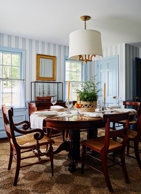 dining room, wooden dining table, wooden dining chairs, blue and white striped wallpaper