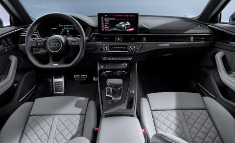 land vehicle, vehicle, car, luxury vehicle, center console, steering wheel, audi, executive car, gear shift, personal luxury car,