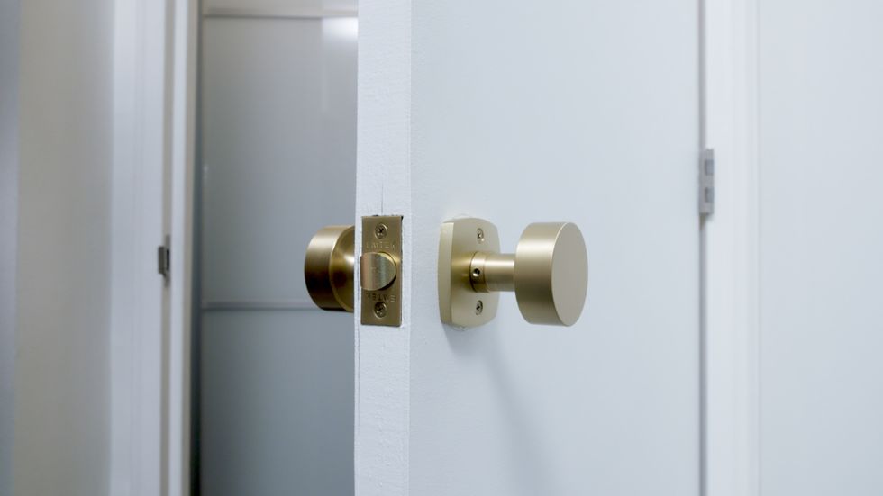 Lock, Door handle, Door, Dead bolt, Brass, Room, Metal, Handle, Hardware accessory, Interior design, 