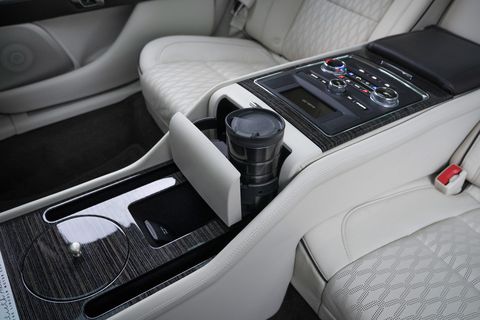 Vehicle, Center console, Car, Luxury vehicle, Personal luxury car, Family car, Gear shift, 