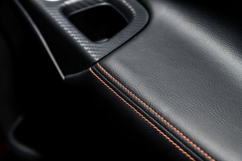 Black, Leather, Automotive design, Car, Material property, Vehicle, Carbon, Textile, 