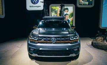 Land vehicle, Vehicle, Car, Auto show, Motor vehicle, Headlamp, Sport utility vehicle, Automotive design, Automotive exterior, Bumper, 