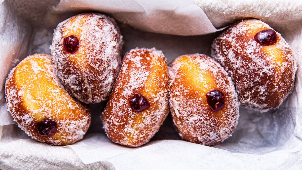Video player poster image preview for Tess Makes Her Family's Favorite Jelly Donuts For Hanukkah | Slightly Kosher