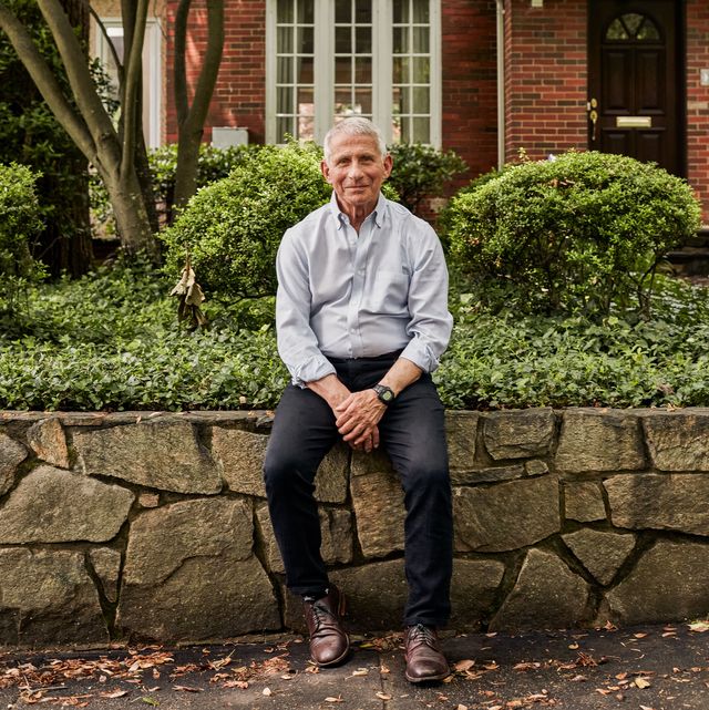dr anthony fauci outside of a brick house