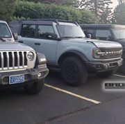 ford bronco next to jeep wrangler