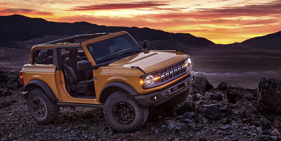 pre production 2021 two door bronco black diamond series in cyber orange metallic tri coat with available sasquatch™ off road package