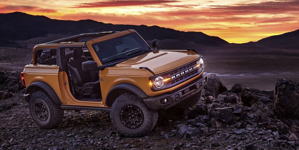 pre production 2021 two door bronco black diamond series in cyber orange metallic tri coat with available sasquatch™ off road package
